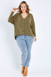 Model Jess wearing size 14 of the Paper Daisy High Waisted Jeans in colour Denim (Blue), from the front, showing the whole outfit