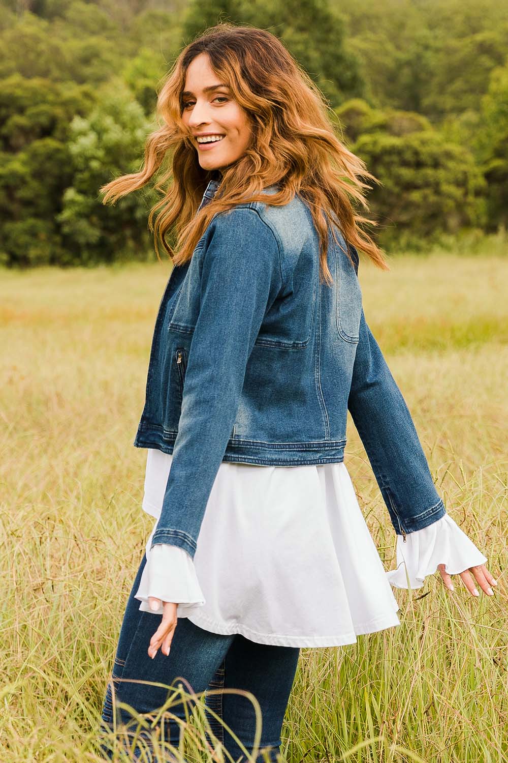 Model Ilona wearing size 10 of the I Have Got This Denim Jacket in colour Denim (Blue), from the front, showing the whole outfit