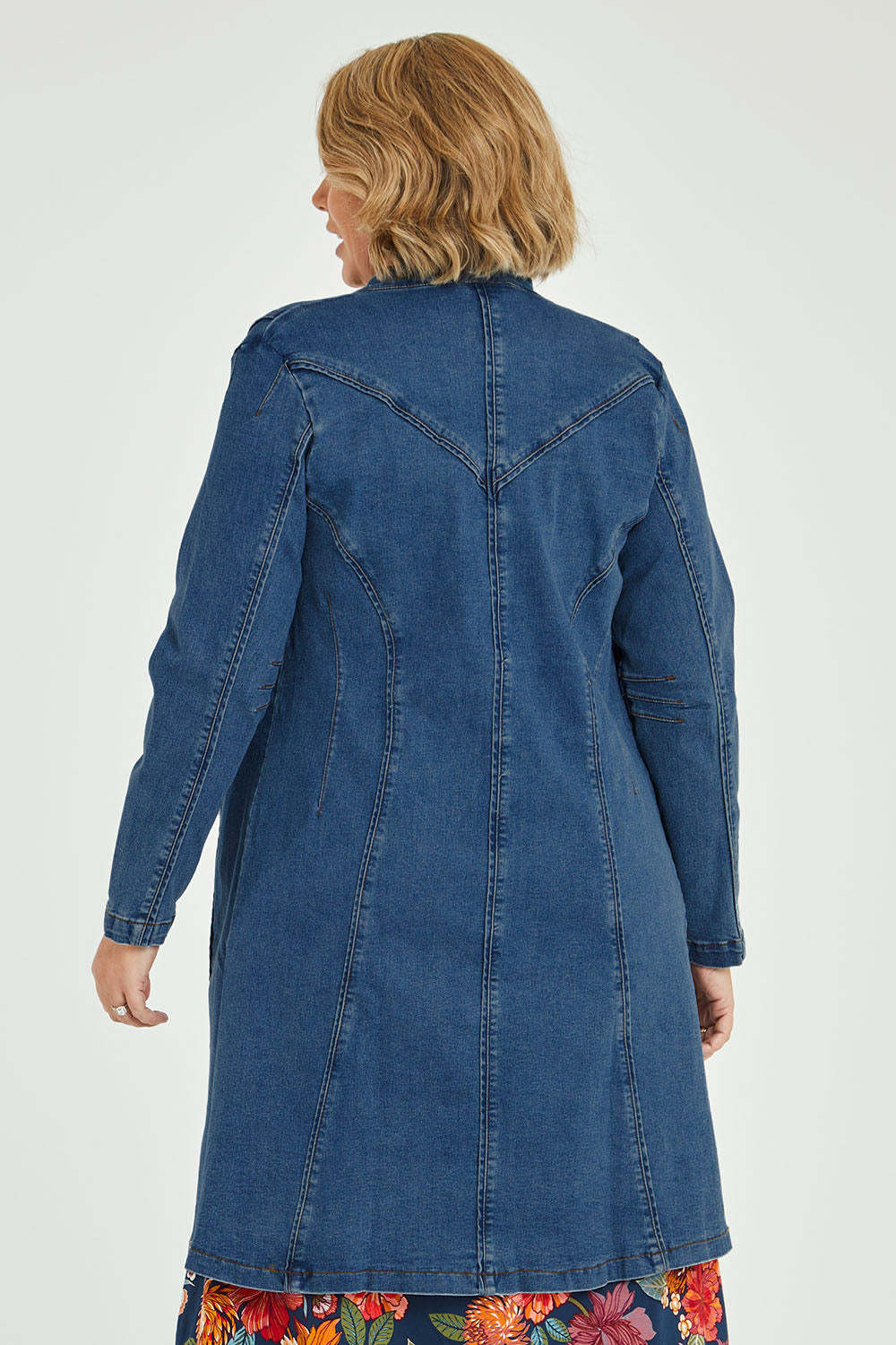 Model Fiona wearing size 16 of the Attention To Me Denim Jacket in colour Denim (Blue), from the back