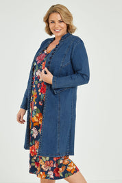 Model Fiona wearing size 16 of the Attention To Me Denim Jacket in colour Denim (Blue), from the front, cropped image