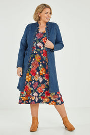 Model Fiona wearing size 16 of the Attention To Me Denim Jacket in colour Denim (Blue), from the front, showing the whole outfit