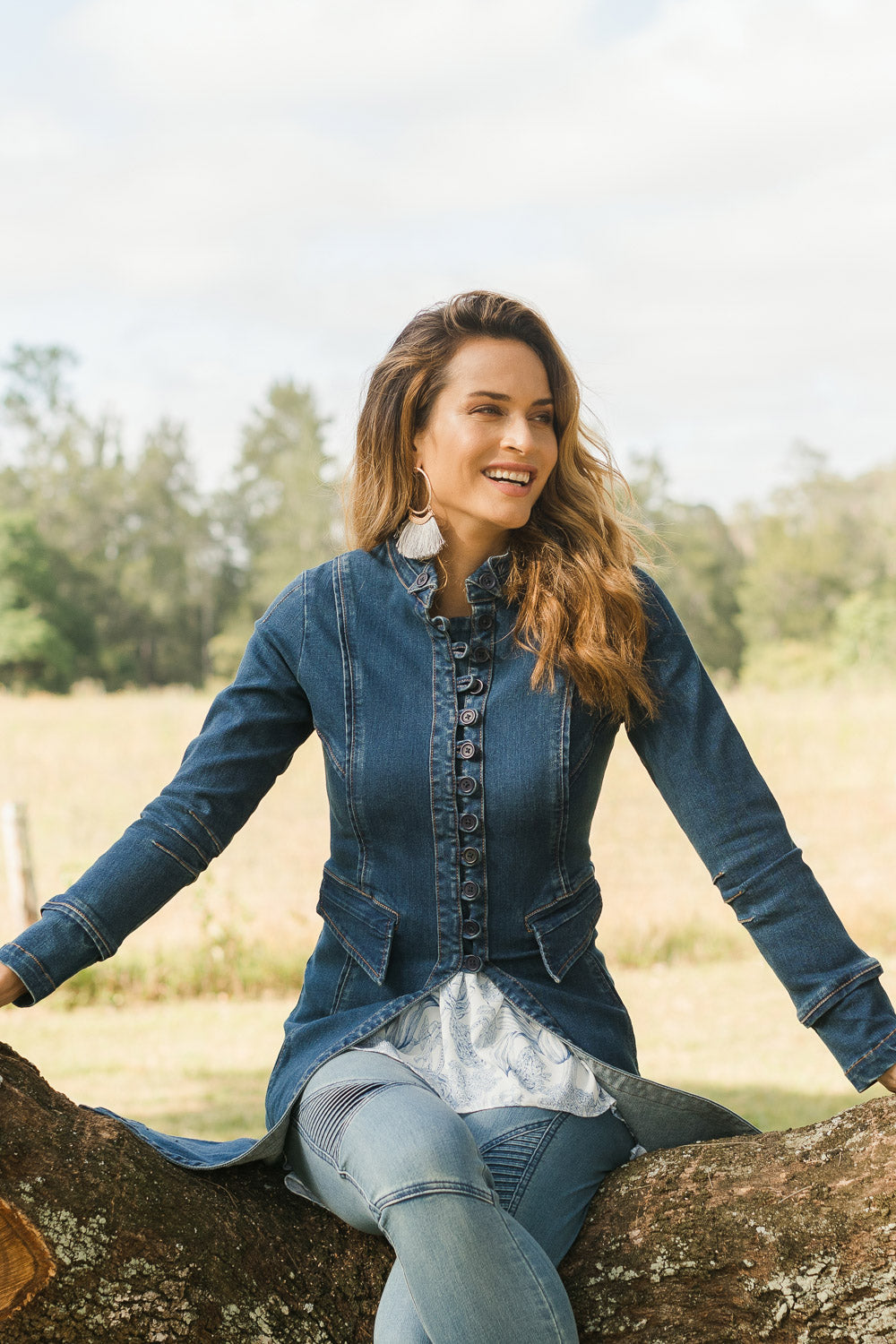 Model Ilona wearing size 10 of the Attention To Me Denim Jacket in colour Denim (Blue), from the front, showing the whole outfit