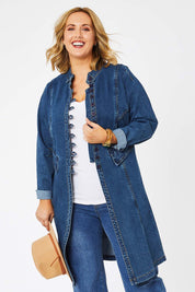 Model Jess wearing size 14 of the Attention To Me Denim Jacket in colour Denim (Blue), from the front, cropped image