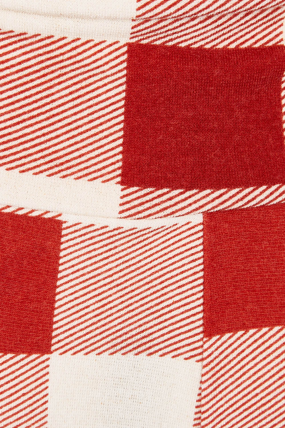 Product shot of the Chasing The Clouds Away Maxi Skirt in colour Rust (Red), detail