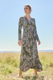 Model Tegan wearing size 10 of the Life Is Beautiful Wrap Maxi Dress in colour Greenpais (Green), from the front, showing the whole outfit