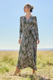 Model Tegan wearing size 10 of the Life Is Beautiful Wrap Maxi Dress in colour Greenpais (Green), from the front, showing the whole outfit