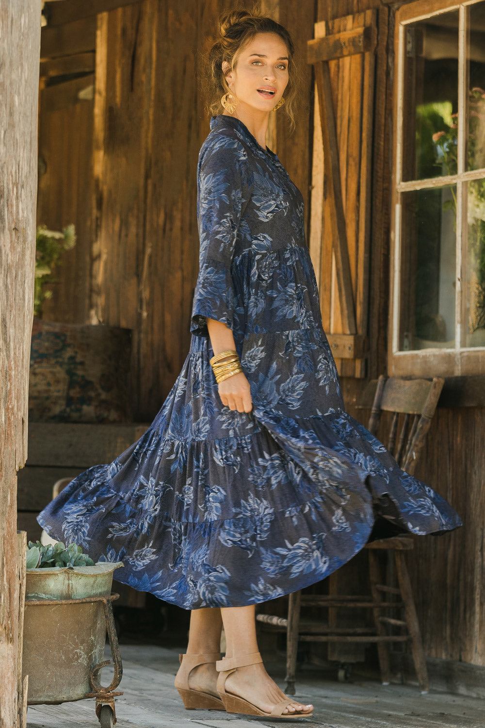 Model Ilona wearing size 10 of the Its Easy Loving You Tiered Dress in colour Bluefleur (Blue), from the front, showing the whole outfit