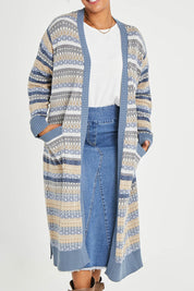 Model Noli wearing size L of the Wild Heart Cardi in colour Dusk, from the front, cropped image