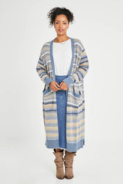 Model Noli wearing size L of the Wild Heart Cardi in colour Dusk, from the front, showing the whole outfit