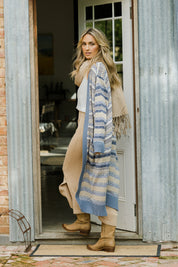 Model Tegan wearing size S of the Wild Heart Cardi in colour Dusk, from the back