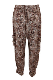 Product shot of the Tied To You Comfort Pants in colour Leopard, from the back