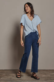 Model Amanda wearing size 10 of the Easy As Plain Pull On Jeans in colour Darkdenim (Blue), from the front, showing the whole outfit