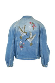 Product shot of the Give Me Wings Denim Jacket in colour Denim (Blue), from the back