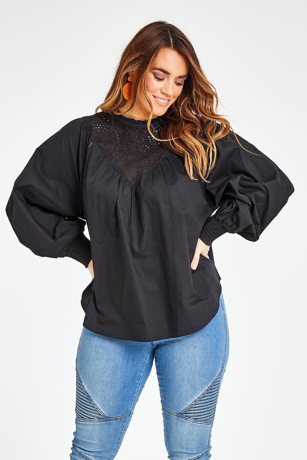 Model Laura wearing size 14 of the Lady Whistledown Blouse in colour Black (Black), from the front, cropped image