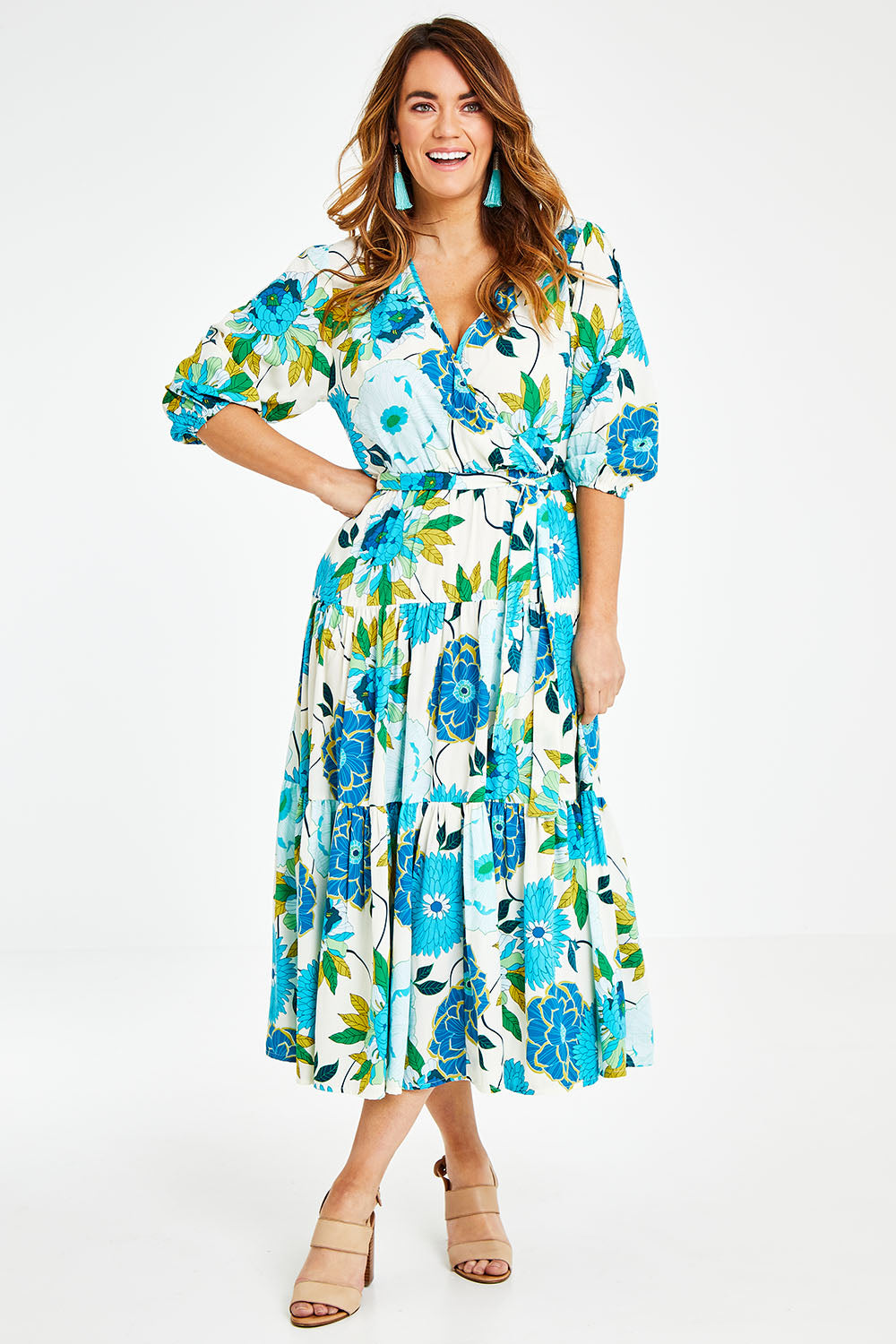 Model Laura wearing size 14 of the Here Comes The Sun Dress in colour Bluegreen (Blue), from the front, showing the whole outfit