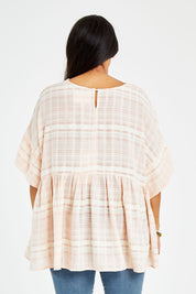 Model Sasha-Lee wearing size 16 of the Perfect As You Are Stripe Top in colour Peach (Pink), from the back