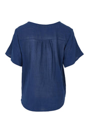 Product shot of the Cute As A Button Blouse in colour Frenchblue (Blue), from the back