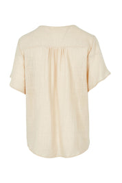 Product shot of the Cute As A Button Blouse in colour Natural, from the back