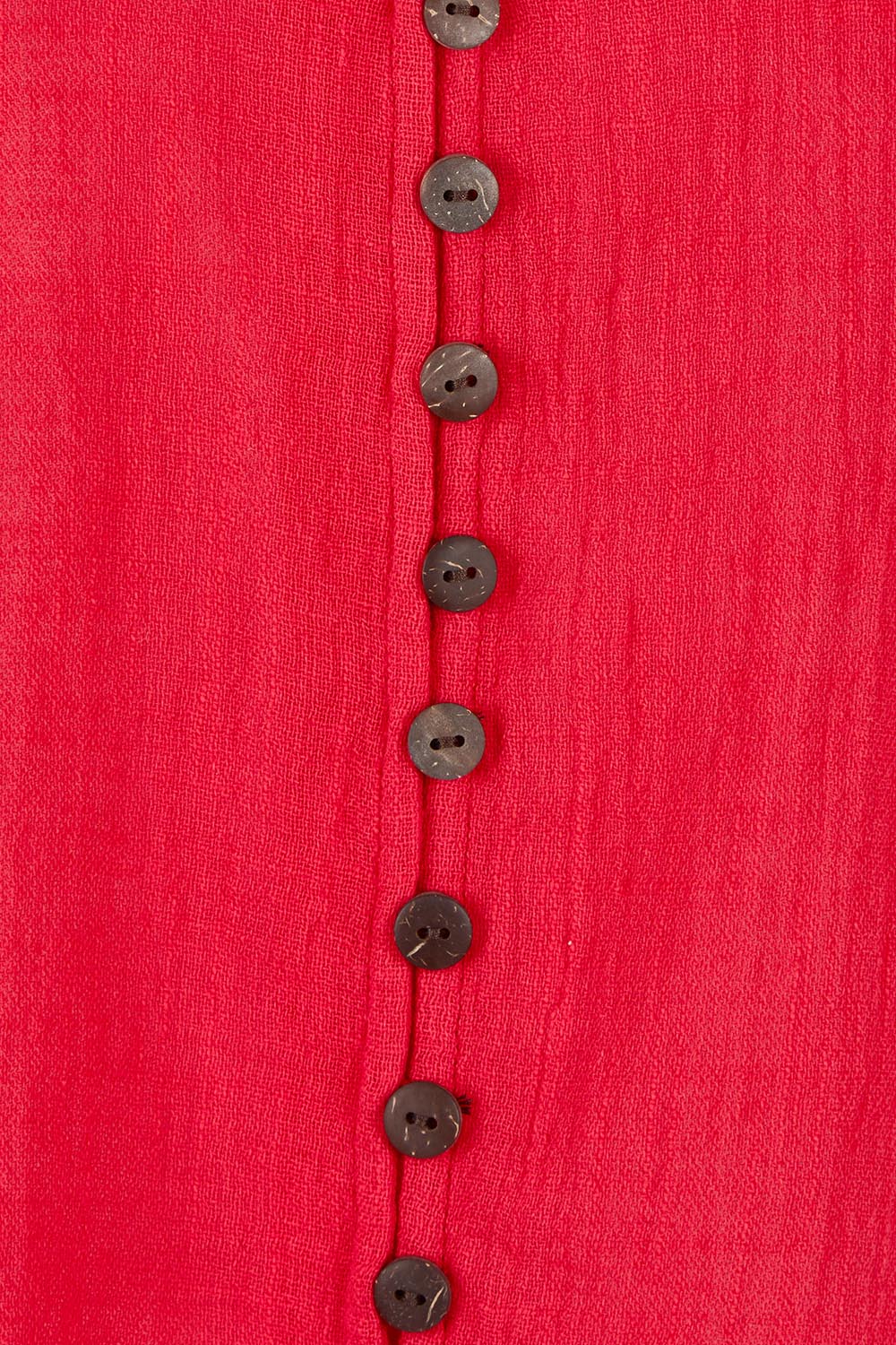 Product shot of the Cute As A Button Blouse in colour Red (Red), detail