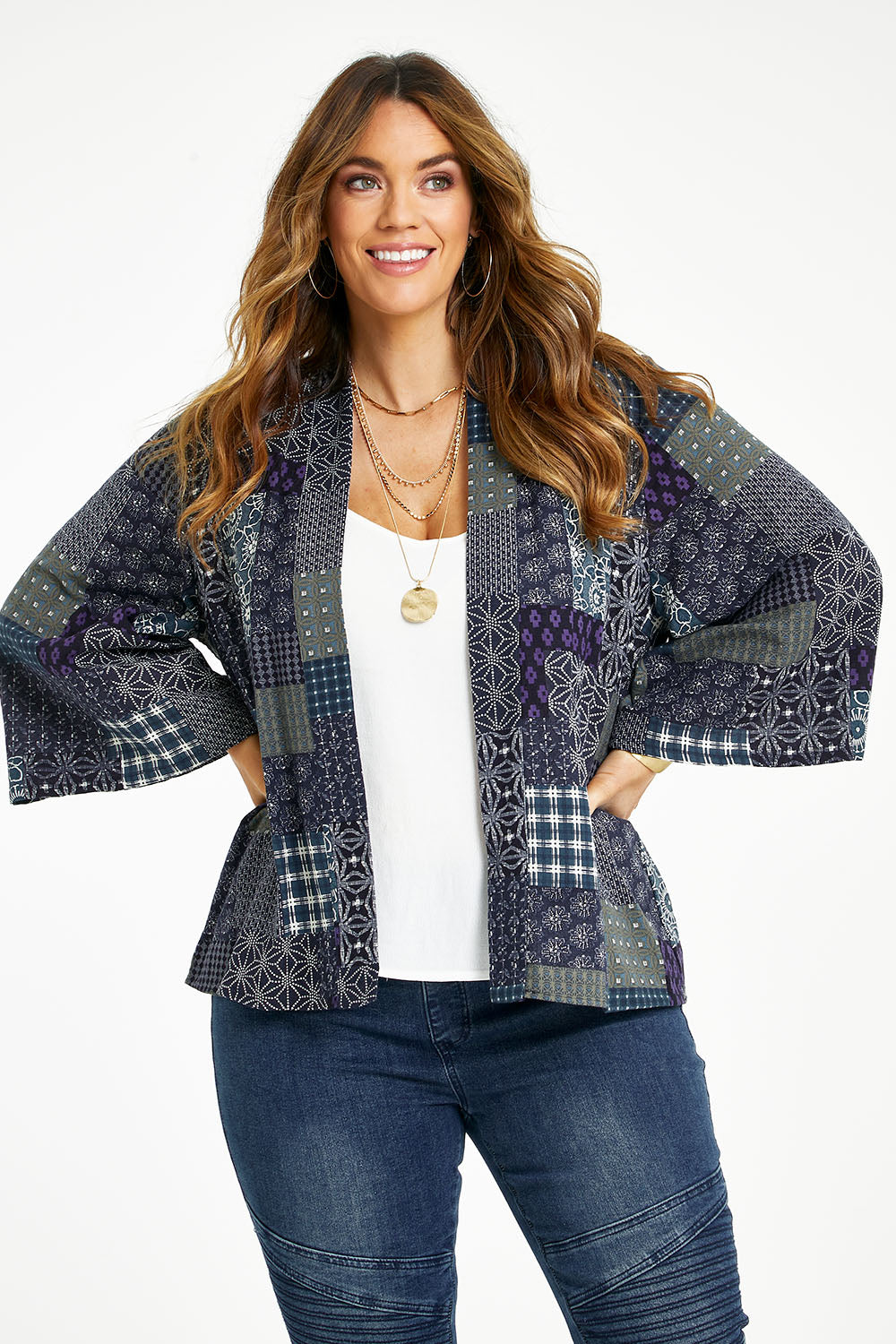Model Laura wearing size 14 of the You Colour My World Kimono in colour Patch (Blue), from the front, cropped image
