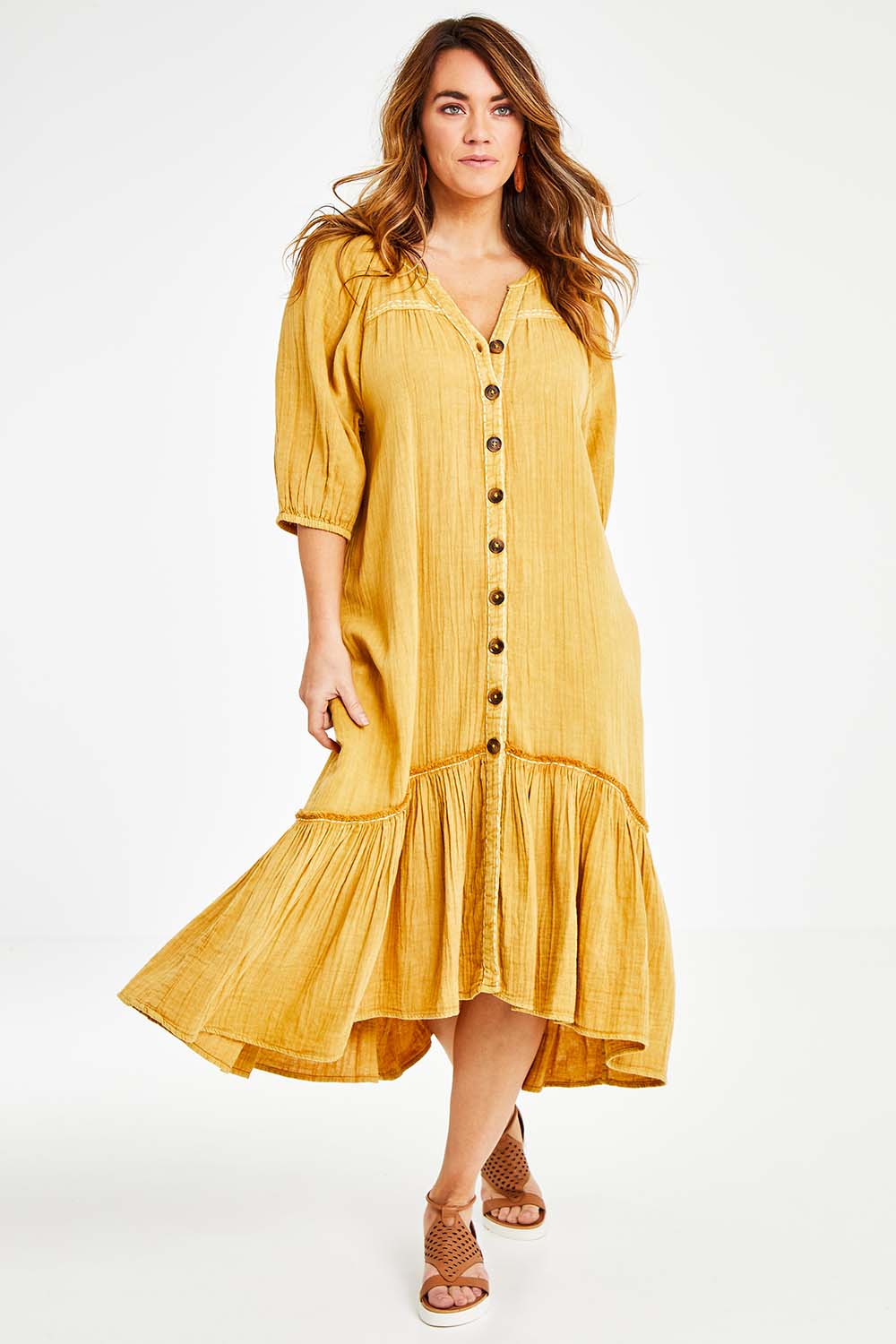 Model Laura wearing size 14 of the Daydreaming In Sunshine Dress in colour Sunflower, from the front, showing the whole outfit