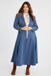 Model Laura wearing size 14 of the Meet Me At Midnight Denim Coat in colour Darkdenim (Blue), from the front, showing the whole outfit