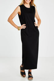 Model Kelly wearing size 10 of the Ready For Anything Tank Dress in colour Black (Black), from the front, cropped image