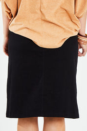 Model Jess wearing size 14 of the Hold My Hand Denim Skirt in colour Black (Black), from the front, cropped image