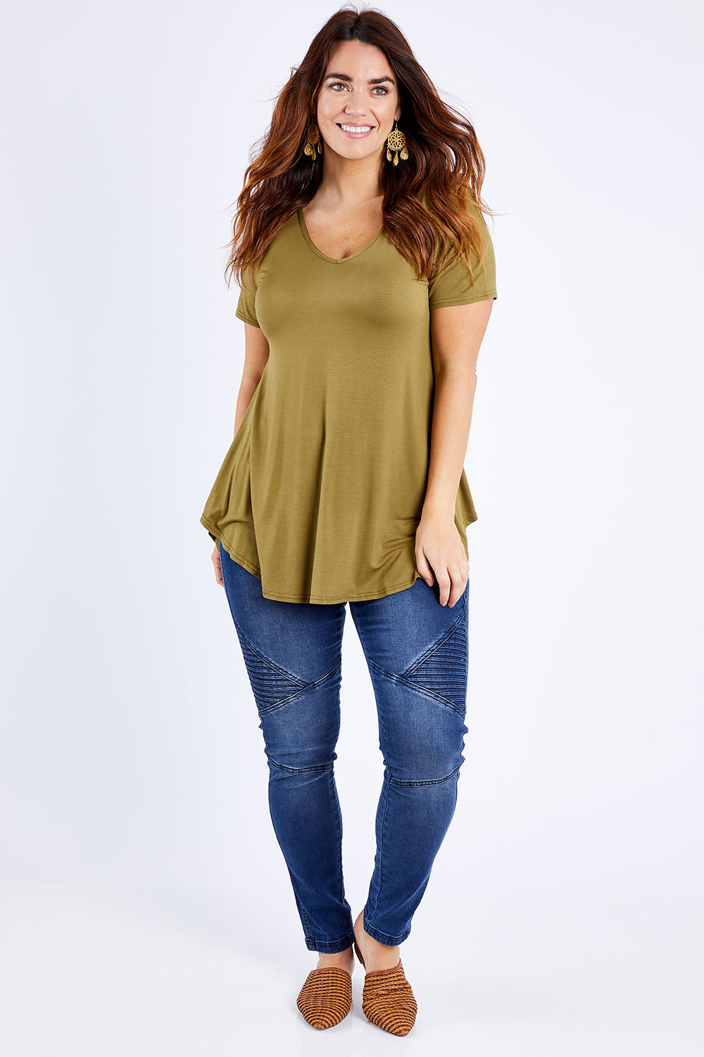 Model Laura wearing size 14 of the Softly Swinging Bamboo Tee in colour Olive (Green), from the front, showing the whole outfit