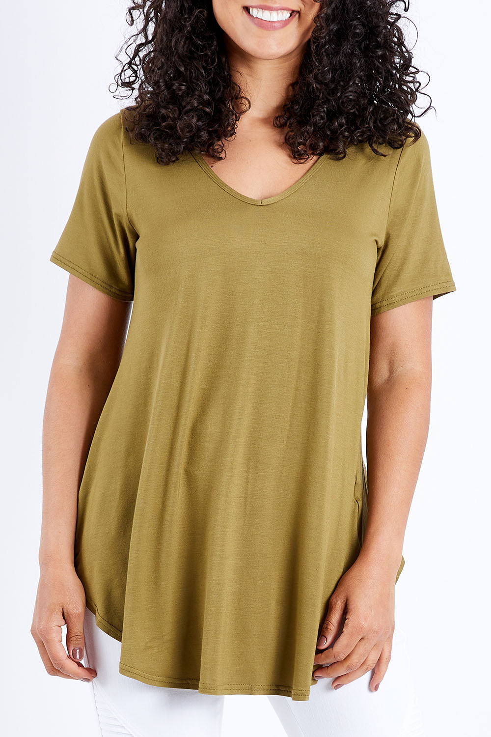 Model Pamela wearing size 10 of the Softly Swinging Bamboo Tee in colour Olive (Green), from the front, cropped image