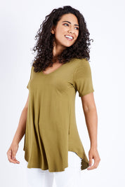 Model Pamela wearing size 10 of the Softly Swinging Bamboo Tee in colour Olive (Green), from the front, cropped image