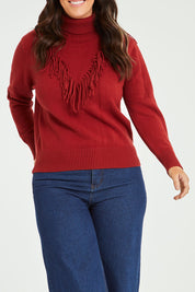 Model Laura wearing size L of the Rules Of The House Sweater in colour Rust, from the front, cropped image