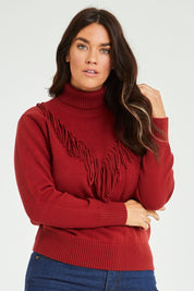 Model Laura wearing size L of the Rules Of The House Sweater in colour Rust, from the front, cropped image