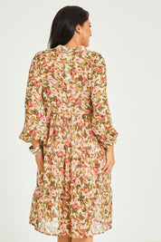 Model Terri-Leigh wearing size 14 of the Floating Through The Day Dress in colour Garden (Pink), from the back