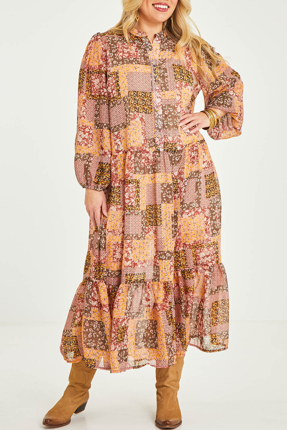 Model Katie wearing size 16 of the Not A Patch On You Dress in colour Muskpatch (Pink), from the front, cropped image
