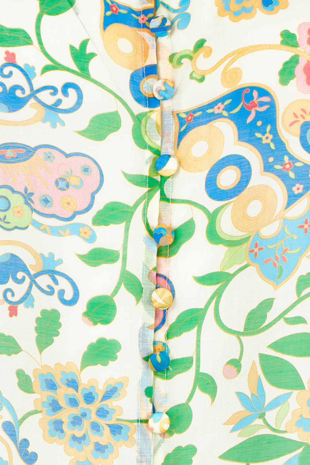 Product shot of the High Tea Garden Party Blouse in colour Garden, detail