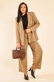 Model Terri-Leigh wearing size 14 of the All For Love Pants in colour Camel, from the front, showing the whole outfit
