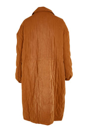 Product shot of the Heart Warming Quilted Anorak in colour Rust, from the back