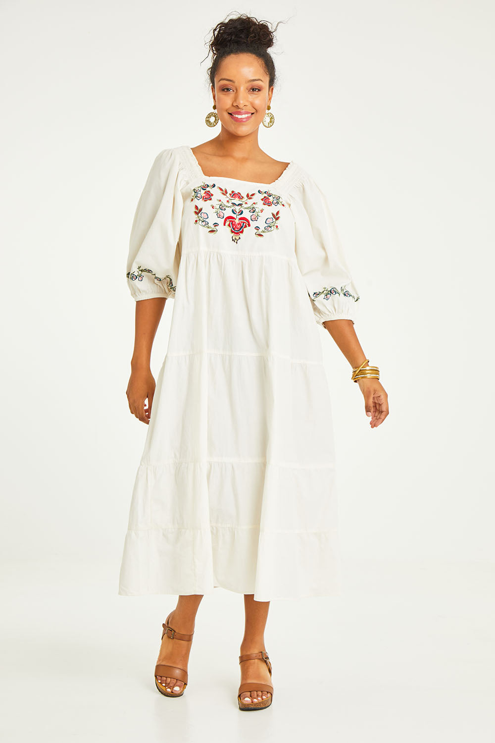 Model Noli wearing size 14 of the Picnic In The Fields Embroidered Dress in colour Milk (White), from the front, showing the whole outfit
