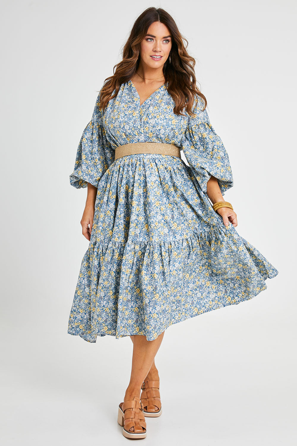 Model Laura wearing size 14 of the Light Of The Sun Cotton Dress in colour Bluefleur (Blue), from the front, showing the whole outfit