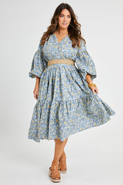 Model Laura wearing size 14 of the Light Of The Sun Cotton Dress in colour Bluefleur (Blue), from the front, showing the whole outfit