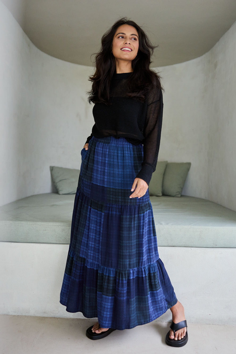 Model Tahnee wearing size 10 of the Chasing Sunsets Skirt in colour Bluecheck (Blue), from the front, showing the whole outfit