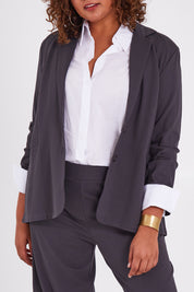 Model Anucia wearing size 14 of the Keeping It Cool Oversized Boyfriend Blazer in colour Castle (Grey), from the front, cropped image