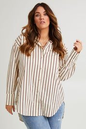 Model Laura wearing size 14 of the Relaxed Elegance Boyfriend Shirt in colour Chocstripe, from the front, cropped image