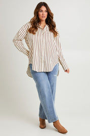 Model Laura wearing size 14 of the Relaxed Elegance Boyfriend Shirt in colour Chocstripe, from the front, showing the whole outfit