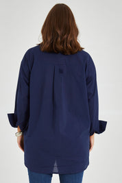Model Monique wearing size 14 of the Relaxed Elegance Boyfriend Shirt in colour Inknavy (Blue), from the back