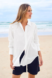 Model Tegan wearing size 10 of the Relaxed Elegance Boyfriend Shirt in colour White (White), from the front, showing the whole outfit
