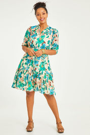 Model Noli wearing size 14 of the Sweet As Sugar Dress in colour Fleurblue (Blue), from the front, showing the whole outfit
