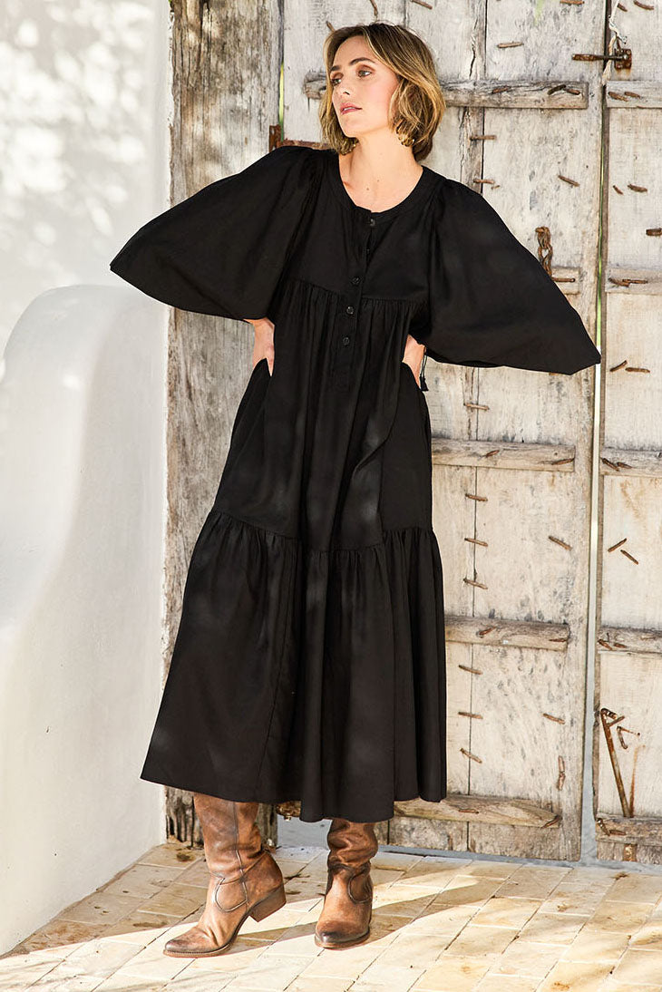 Model Tegan wearing size 10 of the Picture Perfect Linen Dress in colour Black (Black), from the front, showing the whole outfit