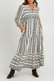 Model Monique wearing size 14 of the Forever Favourite Cotton Maxi Dress in colour Blackstrip, from the front, cropped image